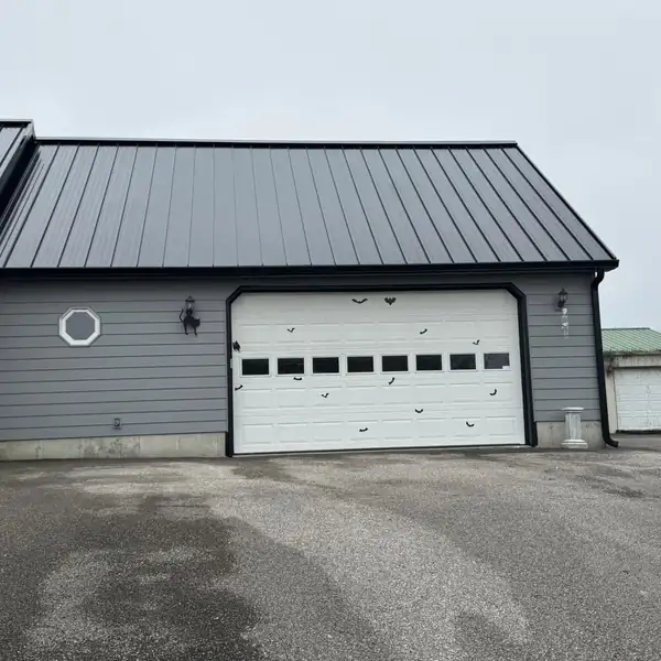 Garage with new seamless gutters