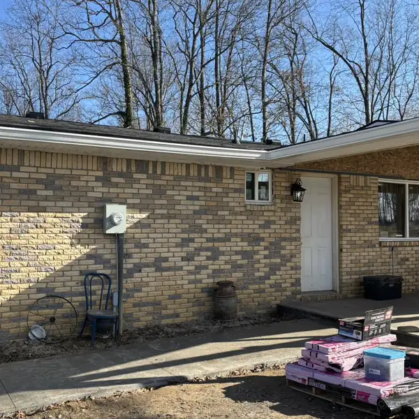 Brick ranch home with new seamless gutters