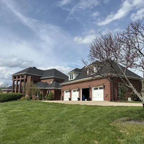 Large brick home with seamless gutters